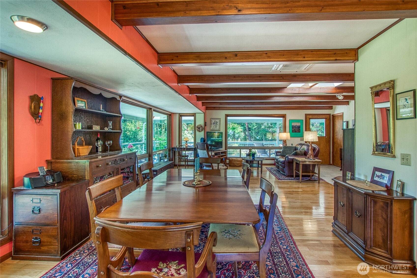 239 Killebrew Lake Road Orcas Island, WA 98280 - Photo 9 of 31 a dining room with furniture and wooden floor