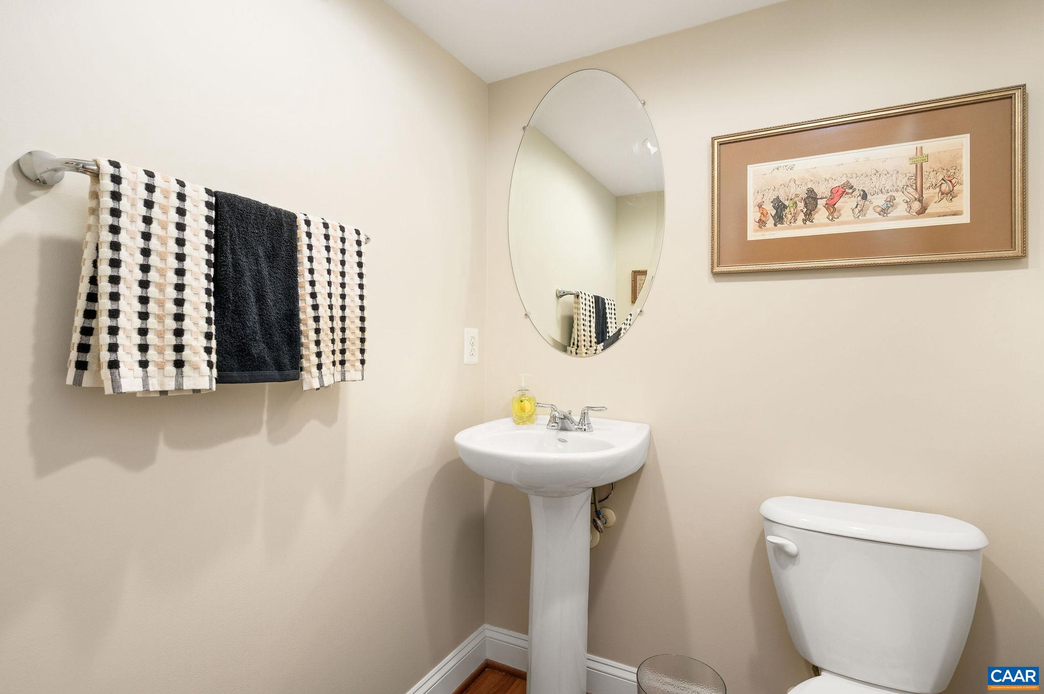 508 Tulip Tree Court Charlottesville, VA 22903 - Photo 14 of 35 a bathroom with a sink toilet and a mirror