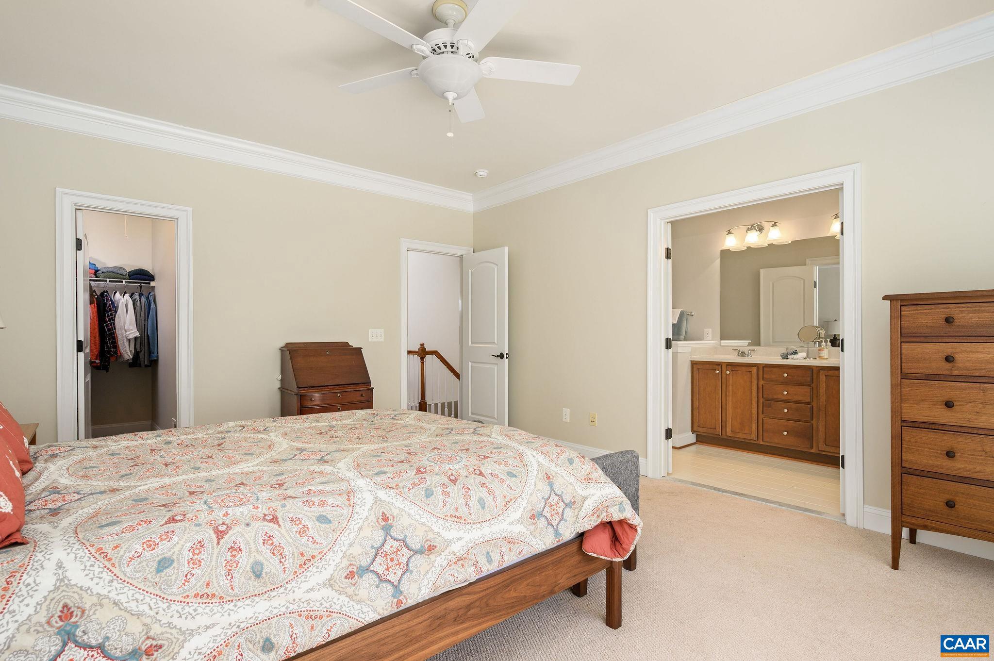 508 Tulip Tree Court Charlottesville, VA 22903 - Photo 17 of 35 a bedroom with a bed and a dresser