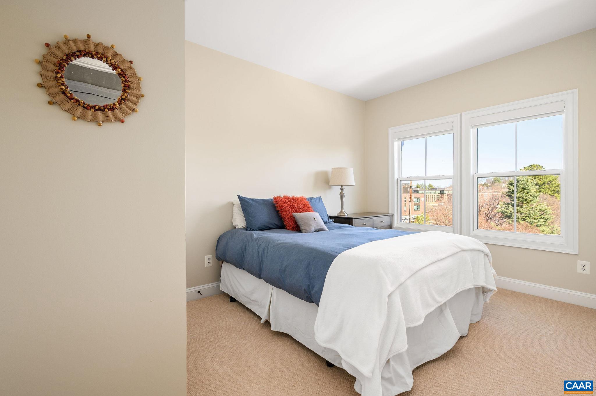 508 Tulip Tree Court Charlottesville, VA 22903 - Photo 21 of 35 a bedroom with a bed and a window