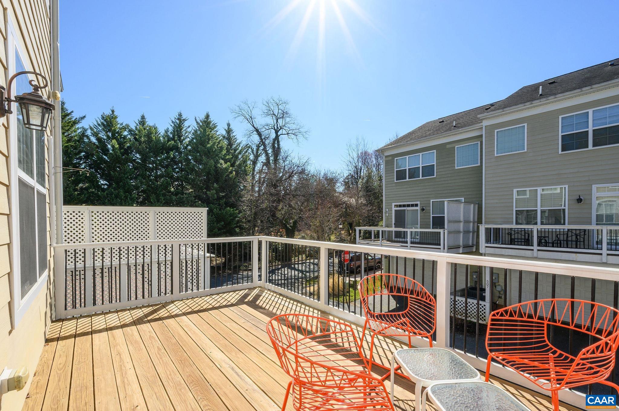 508 Tulip Tree Court Charlottesville, VA 22903 - Photo 26 of 35 a view of a roof deck with wooden floor and fence