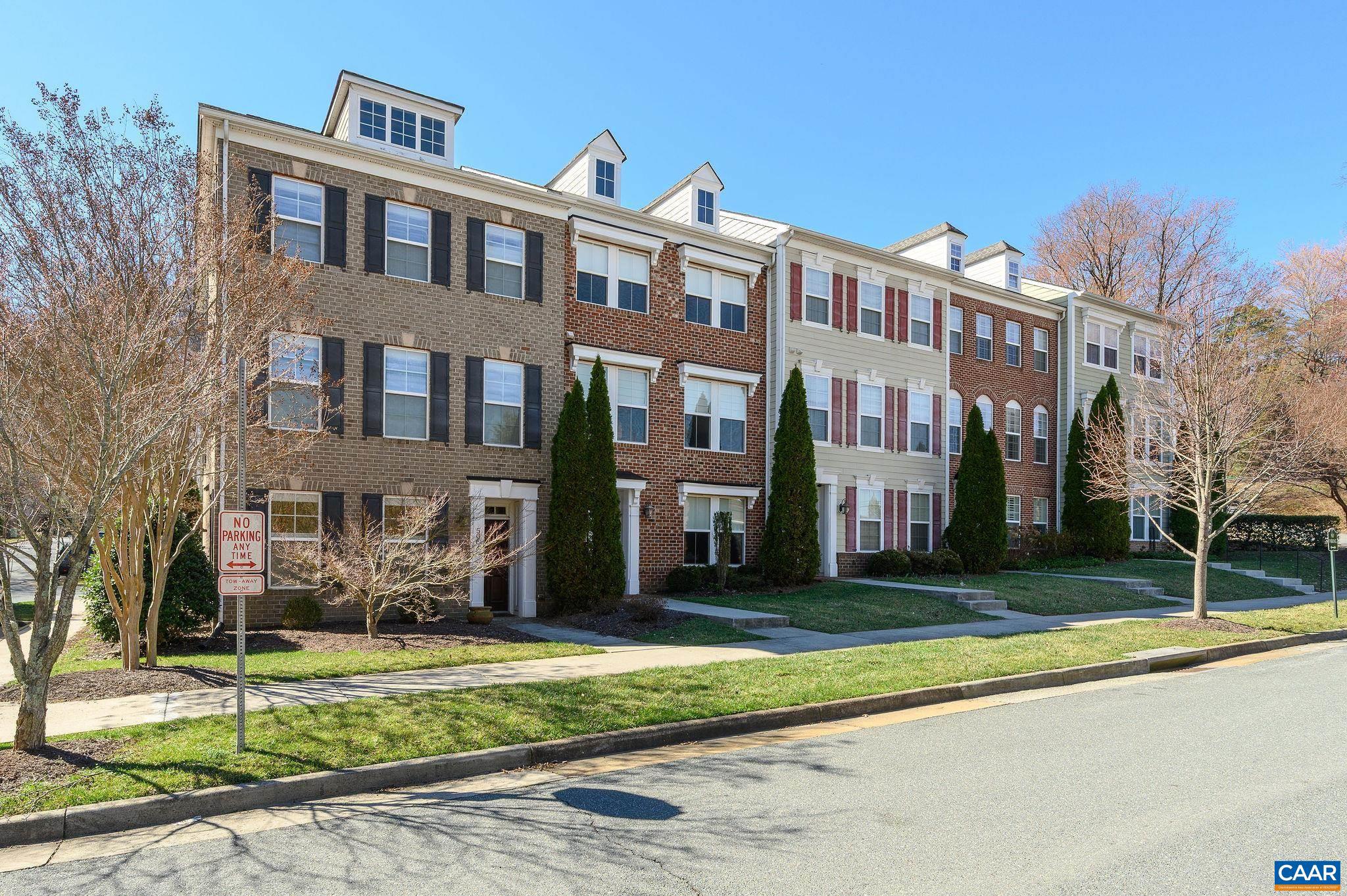 508 Tulip Tree Court Charlottesville, VA 22903 - Photo 27 of 35 a front view of a residential apartment building with a yard