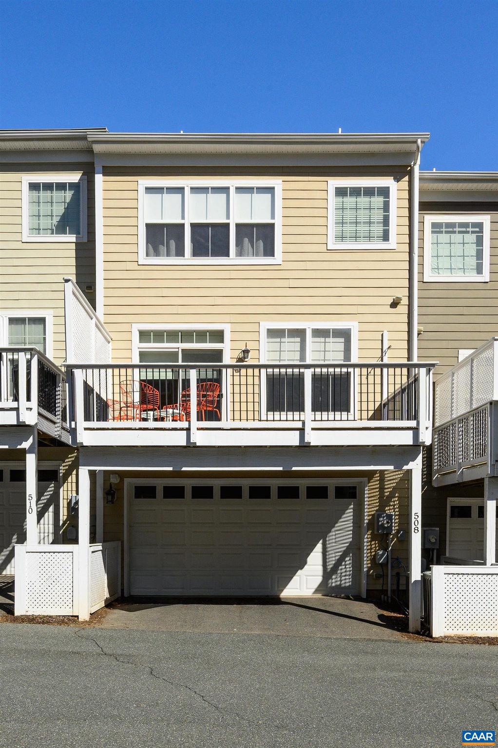 508 Tulip Tree Court Charlottesville, VA 22903 - Photo 31 of 35 a large building with a bench in it