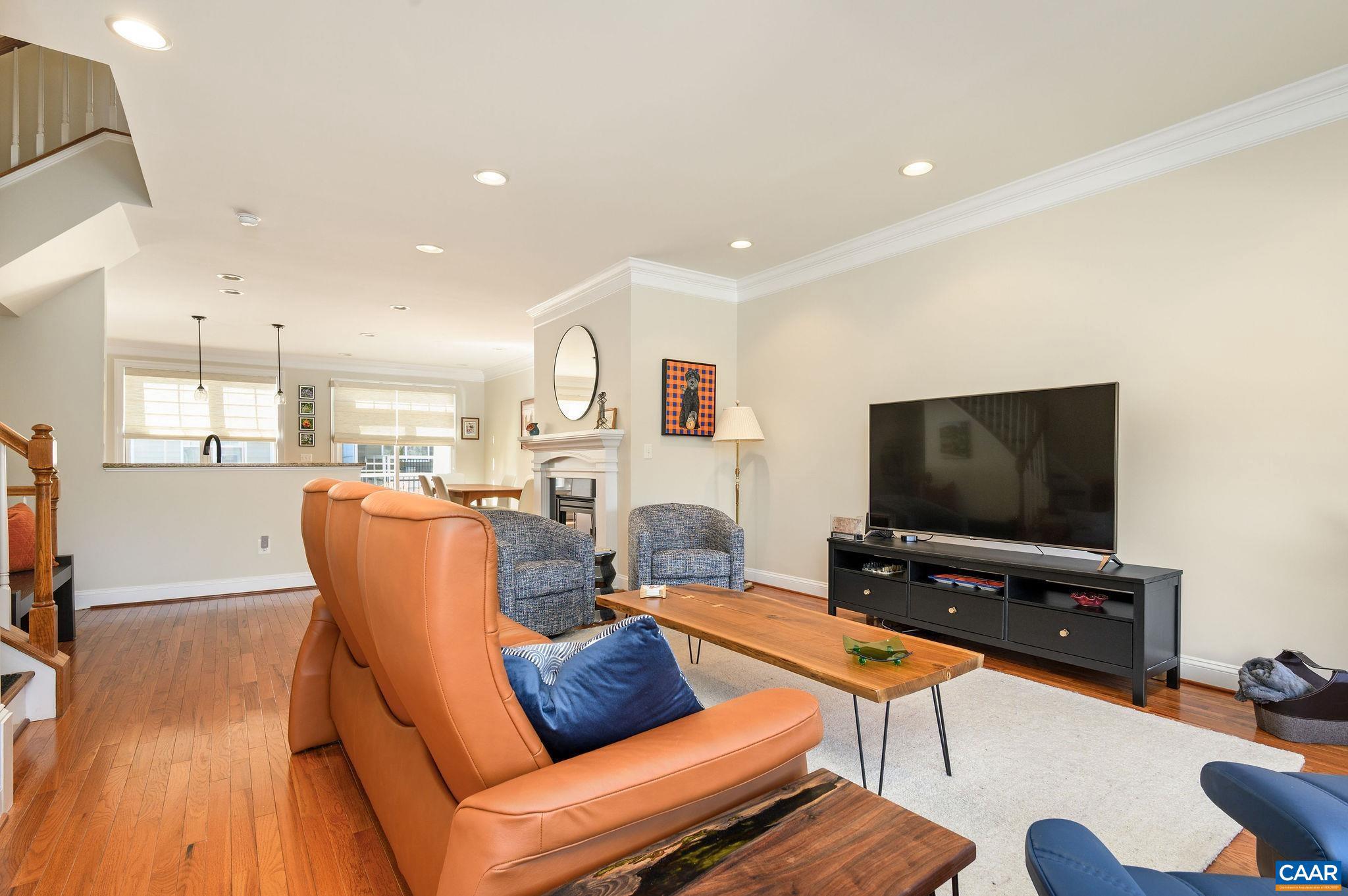 508 Tulip Tree Court Charlottesville, VA 22903 - Photo 8 of 35 a living room with furniture and a flat screen tv