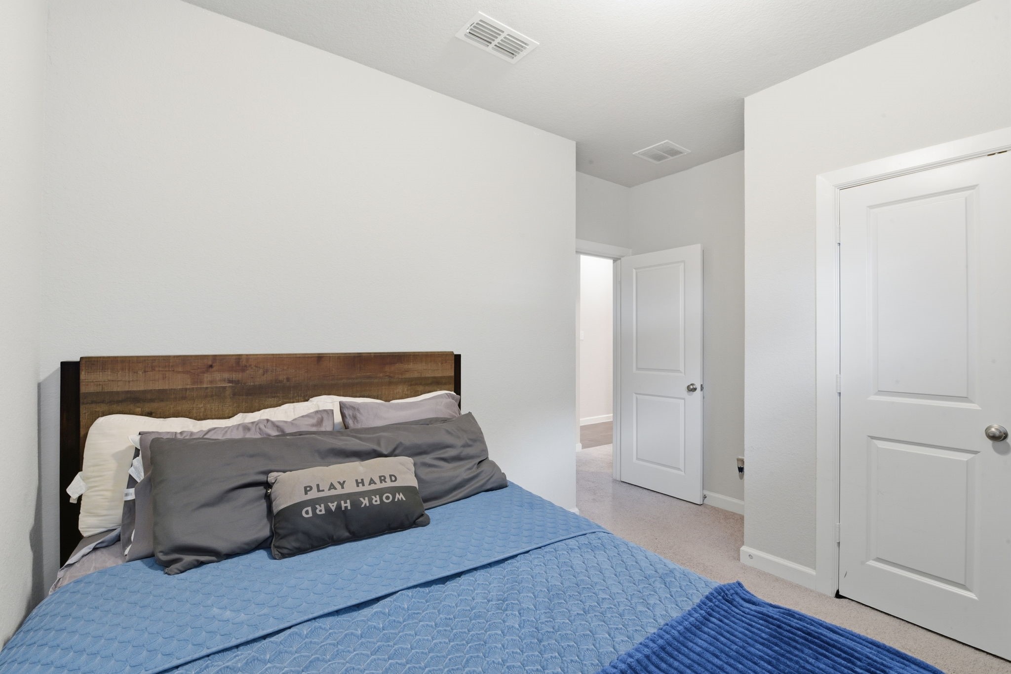 3410 Shockley Lane Rosharon, TX 77583 - Photo 25 of 32 a bedroom with a bed and wooden floor