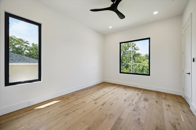 a bathroom with a double vanity sink and mirror