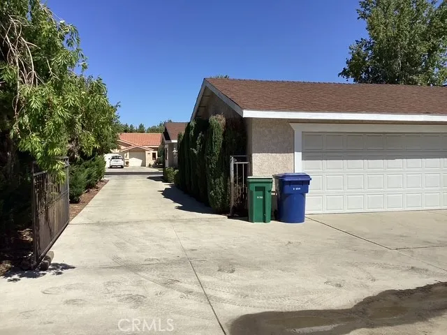 a view of a path along with trees