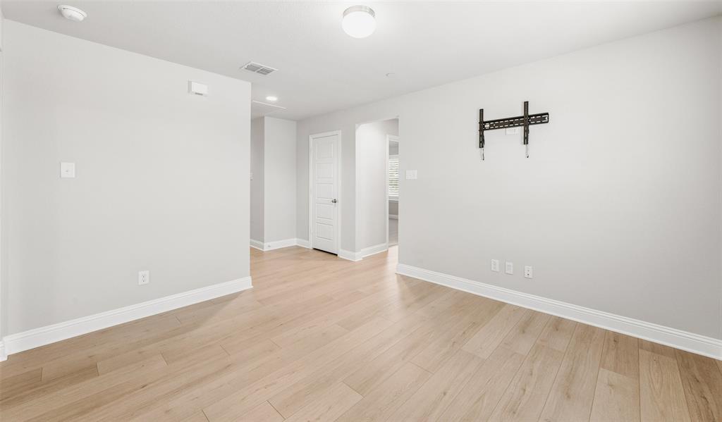 6020 Bursey Road Watauga, TX 76148 - Photo 17 of 33 wooden floor in an empty room