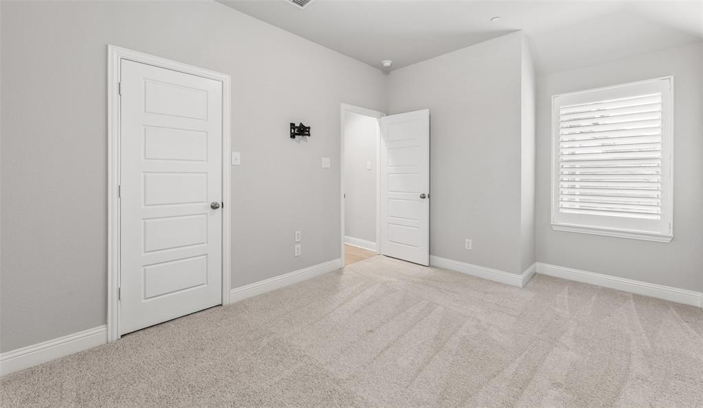 6020 Bursey Road Watauga, TX 76148 - Photo 28 of 33 an empty room with windows and closet