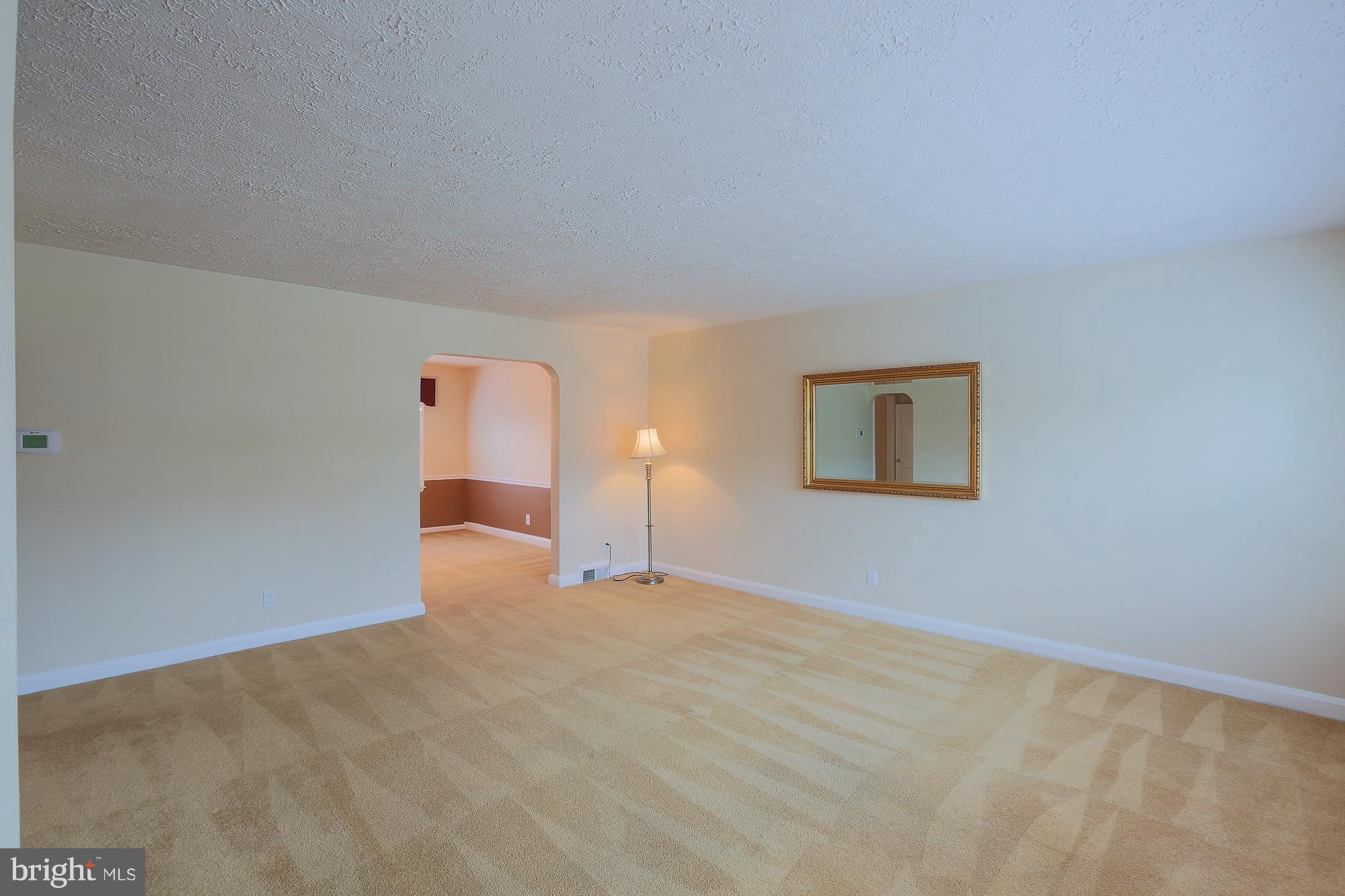 1727 Edgewood Road Towson, MD 21286 - Photo 12 of 29 a view of a room with a refrigerator