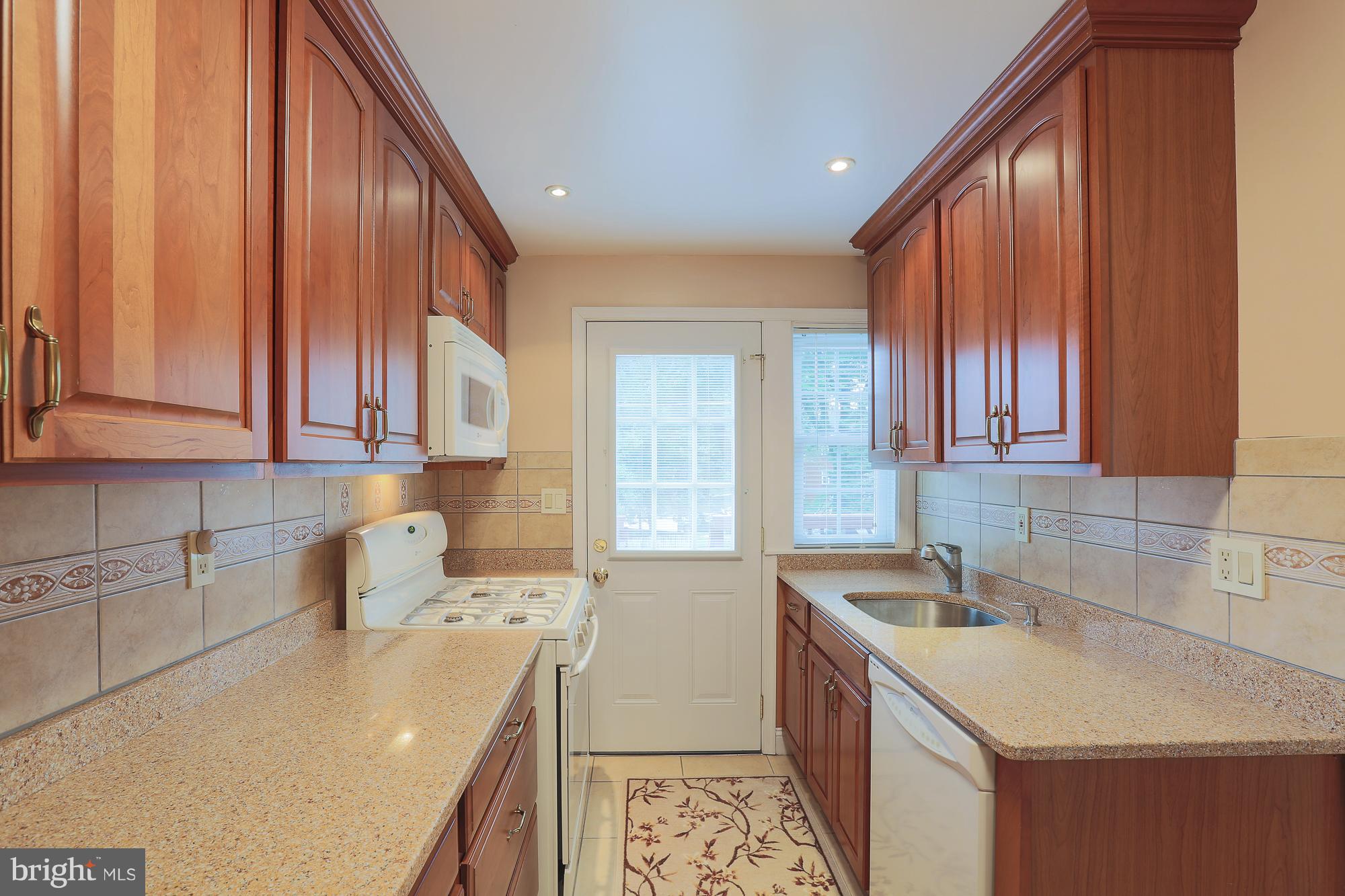 1727 Edgewood Road Towson, MD 21286 - Photo 20 of 29 a room with a sink and a cabinets