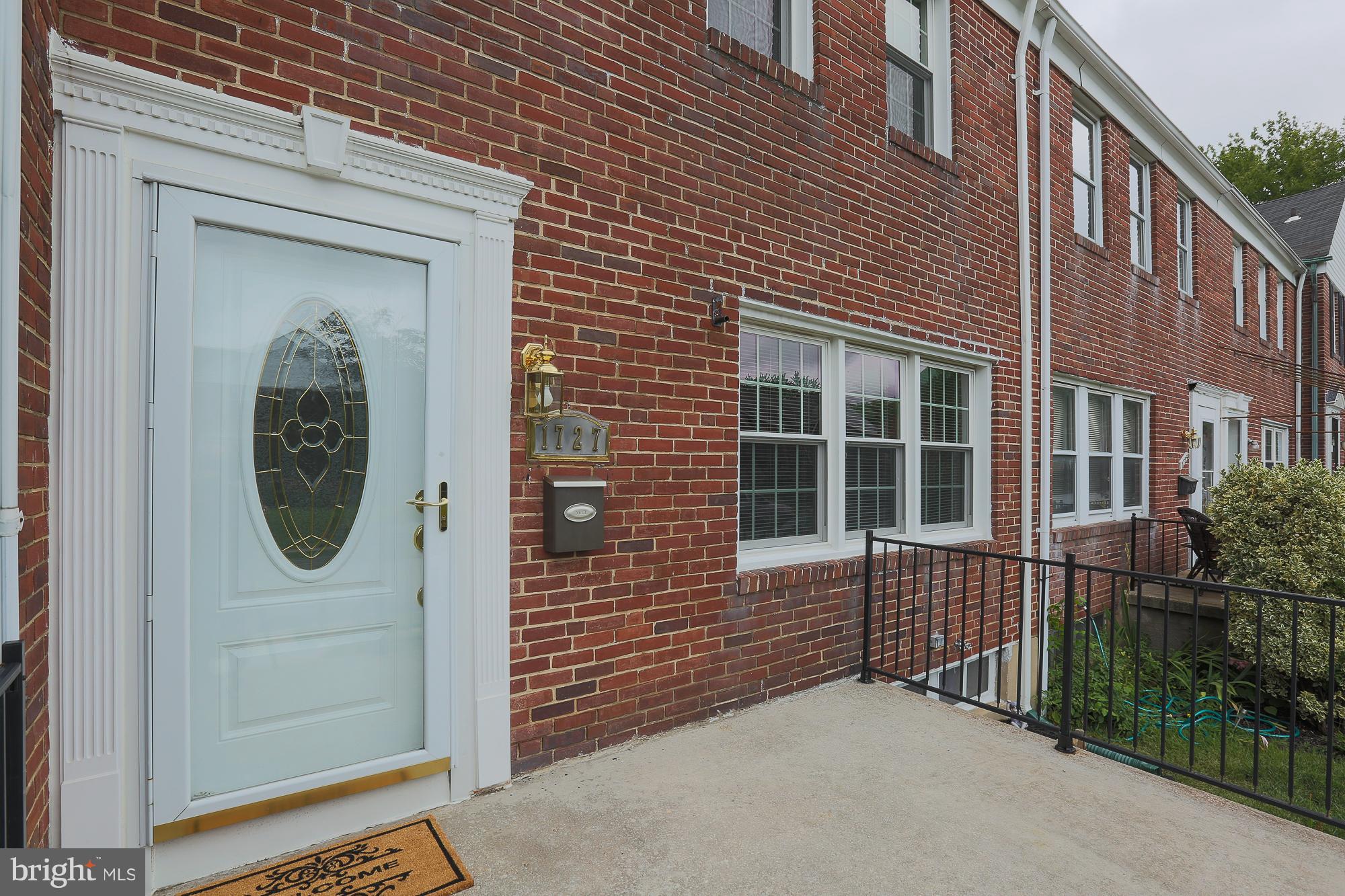 1727 Edgewood Road Towson, MD 21286 - Photo 3 of 29 a front view of a house with a garden