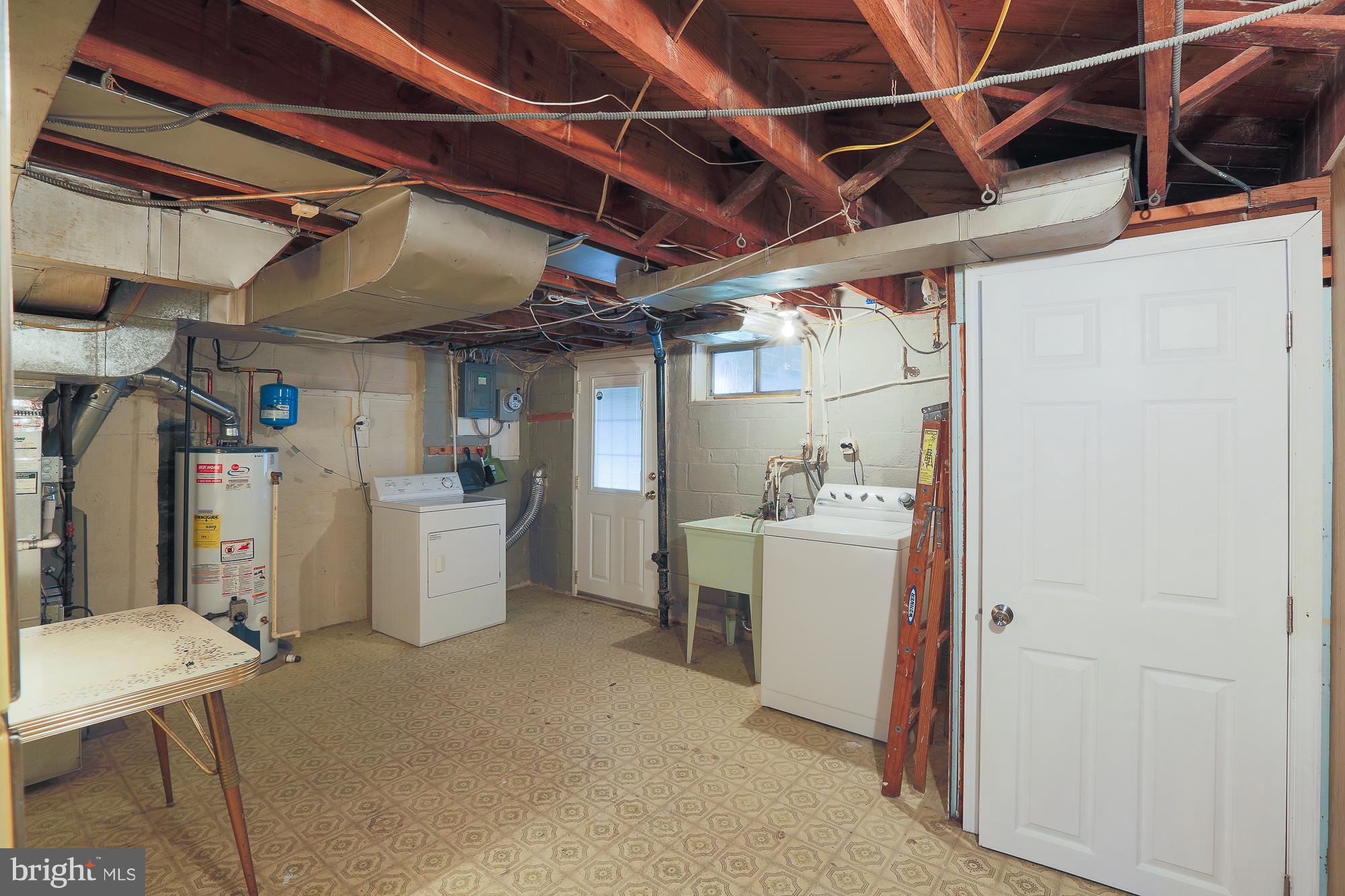 1727 Edgewood Road Towson, MD 21286 - Photo 29 of 29 a utility room with dryer and washer