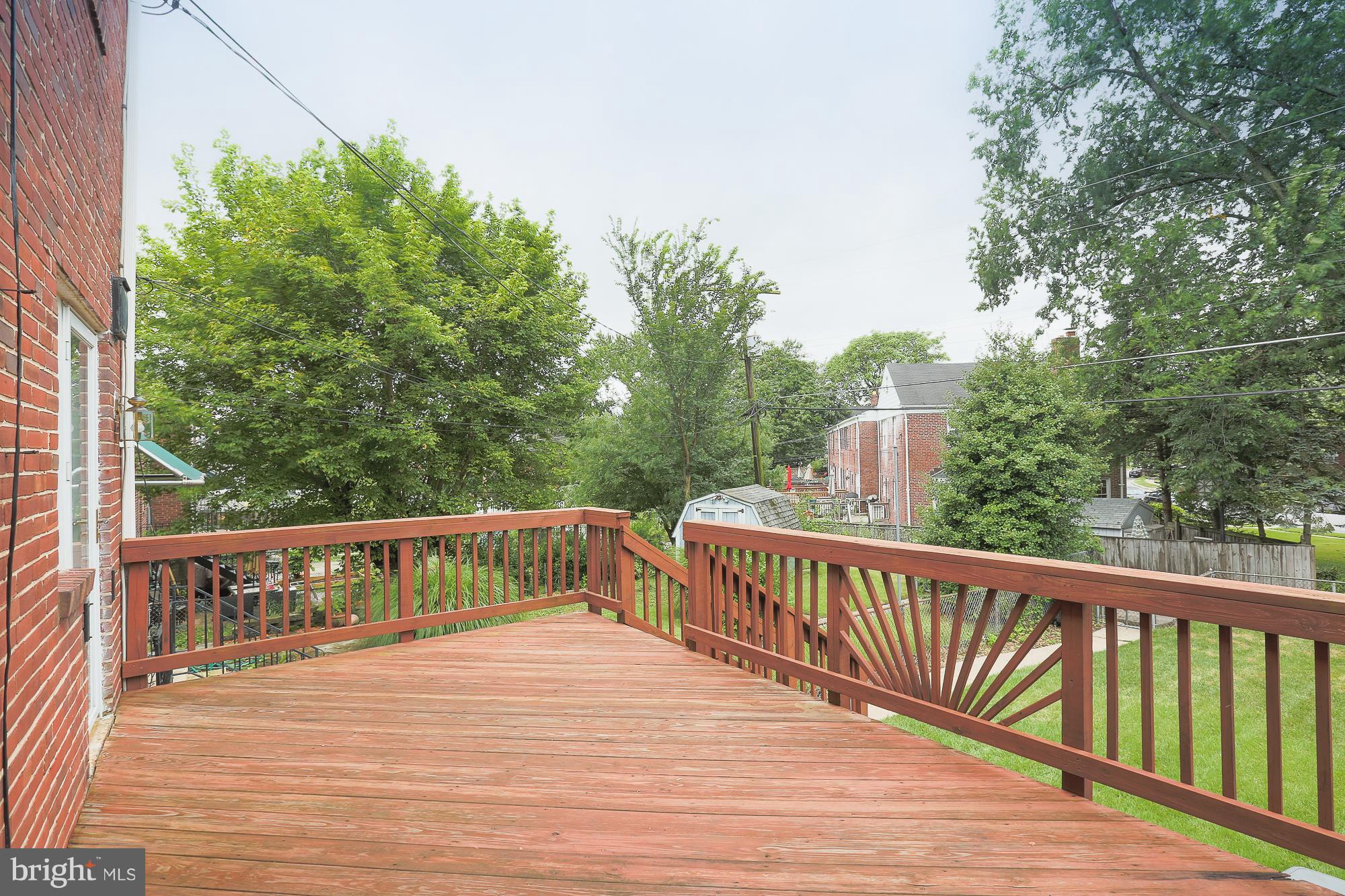 1727 Edgewood Road Towson, MD 21286 - Photo 4 of 29 a view of balcony with deck and trees