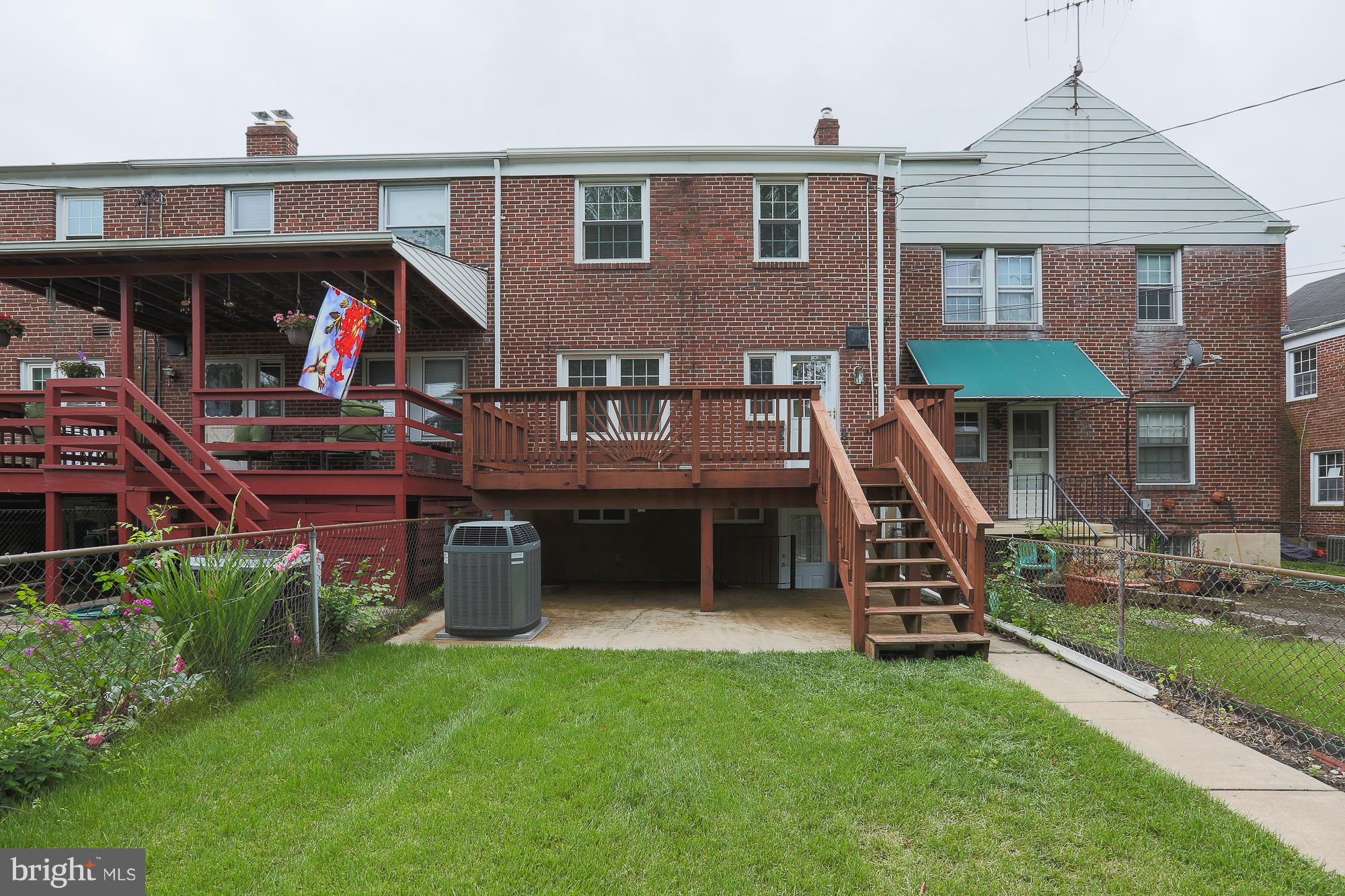 1727 Edgewood Road Towson, MD 21286 - Photo 8 of 29 a front view of house with deck yard and outdoor seating