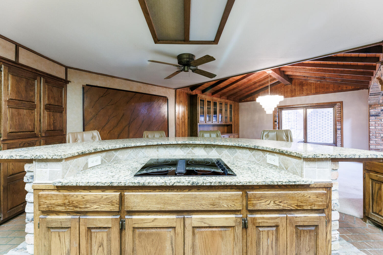 409 Mill Road Lubbock, TX 79403 - Photo 26 of 86 a kitchen with a sink a stove and cabinets
