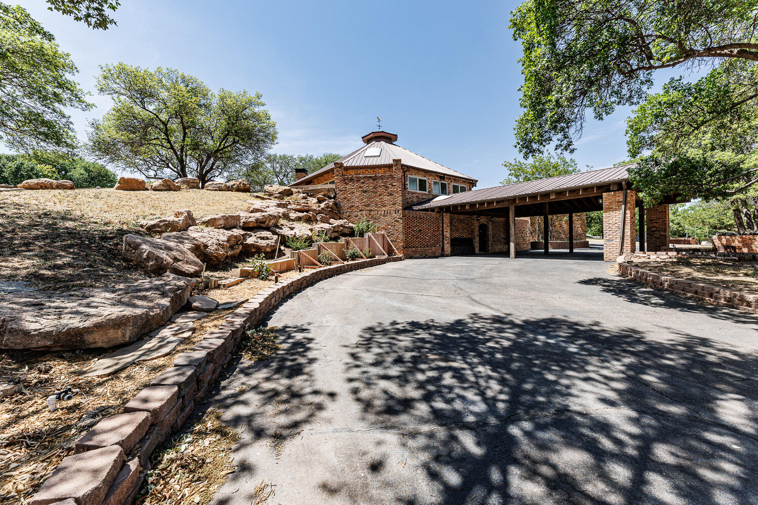 409 Mill Road Lubbock, TX 79403 - Photo 3 of 86 a view of a house with a park