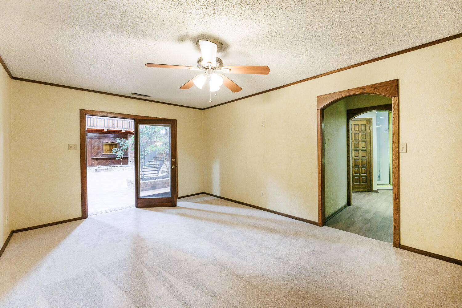409 Mill Road Lubbock, TX 79403 - Photo 55 of 86 an empty room with fan and windows