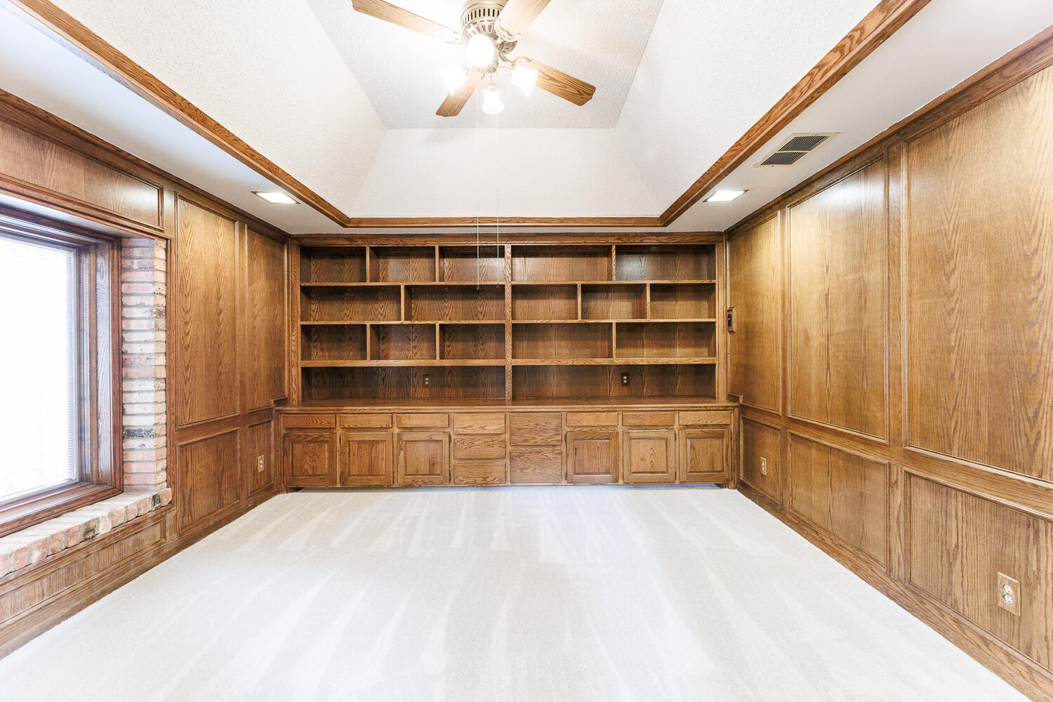 409 Mill Road Lubbock, TX 79403 - Photo 60 of 86 a room with a furniture and a window