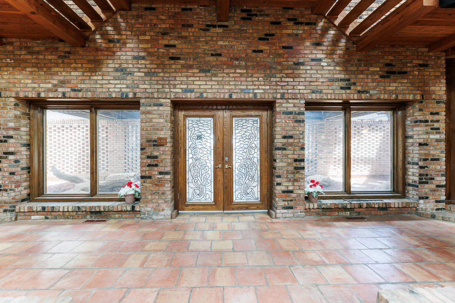 409 Mill Road Lubbock, TX 79403 - Photo 10 of 86 a view of a brick house with outdoor area