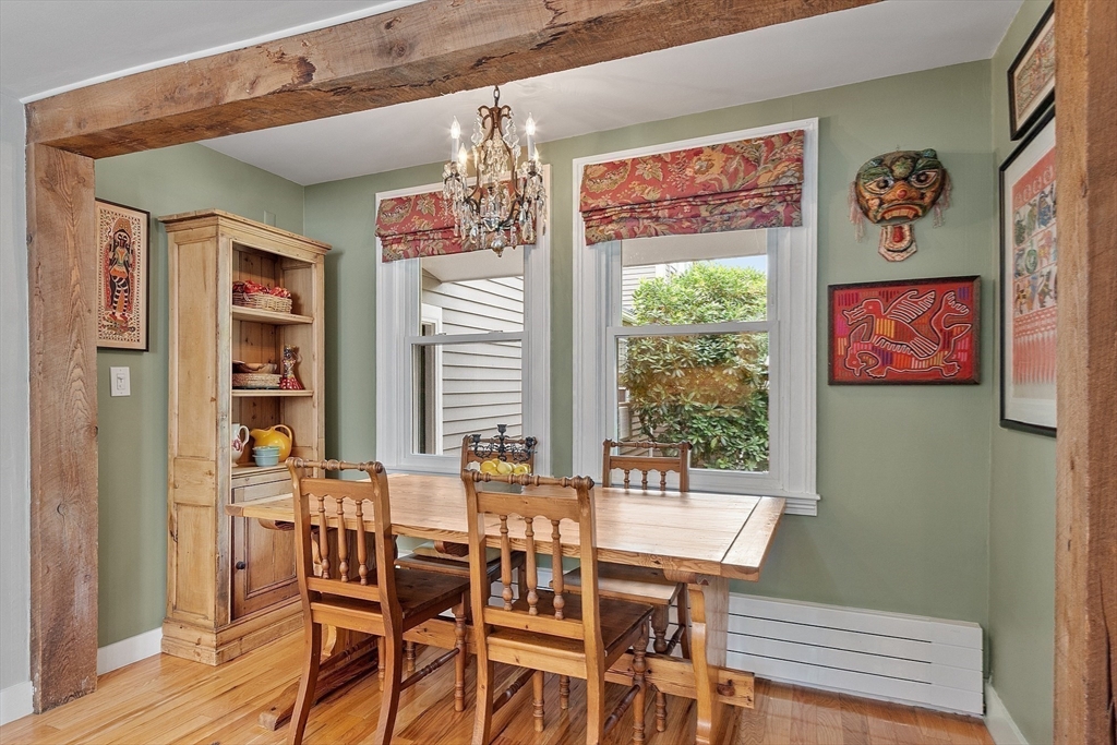394 Plainfield Road, Unit 394 Concord, MA 01742 - Photo 19 of 40 a view of a dining room with furniture window and outside view