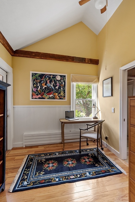 394 Plainfield Road, Unit 394 Concord, MA 01742 - Photo 20 of 40 a living room with furniture and a rug