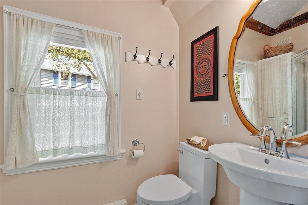 394 Plainfield Road, Unit 394 Concord, MA 01742 - Photo 21 of 40 a bathroom with a sink and a mirror