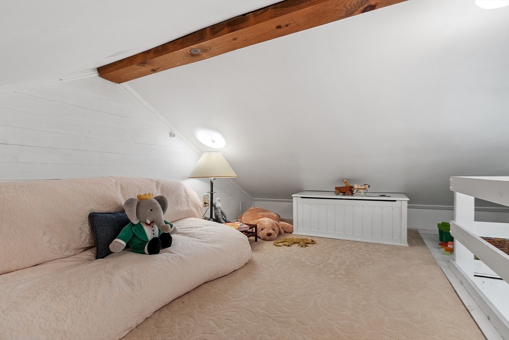 394 Plainfield Road, Unit 394 Concord, MA 01742 - Photo 34 of 40 a room with bed and a window