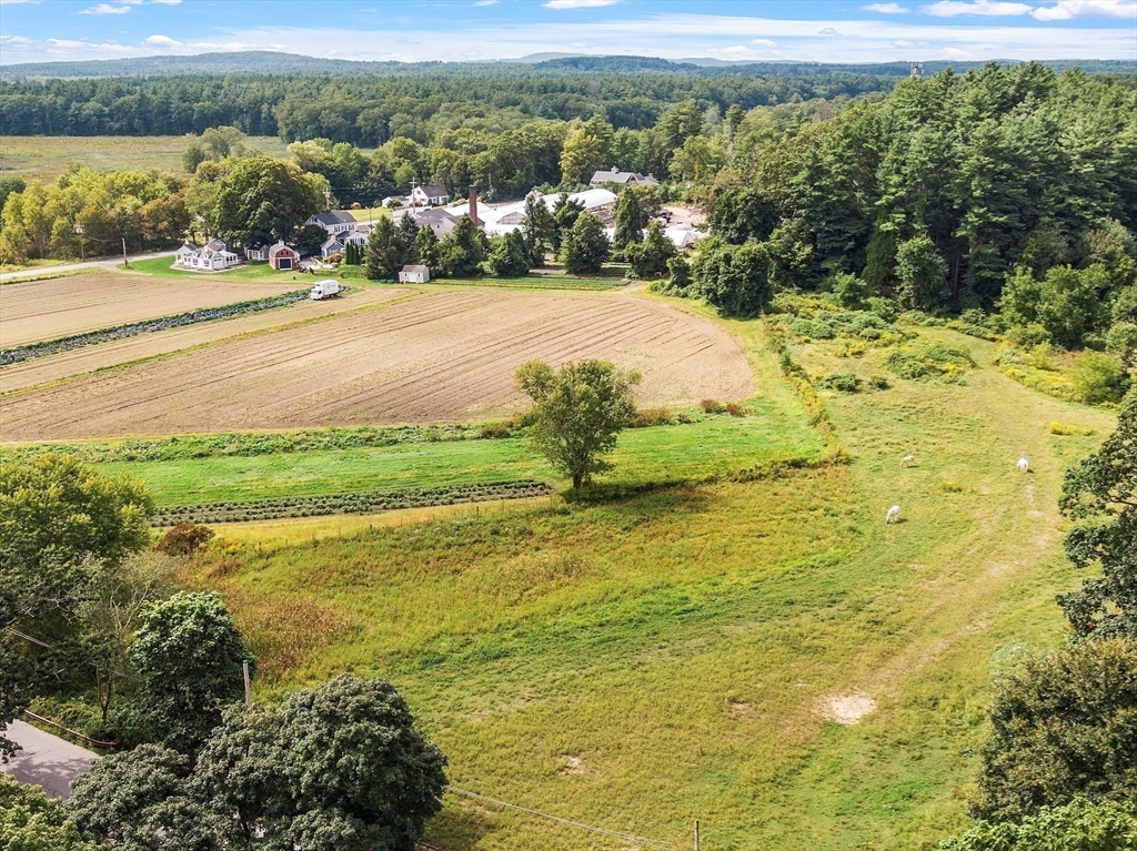 394 Plainfield Road, Unit 394 Concord, MA 01742 - Photo 37 of 40 a view of a lake with a mountain