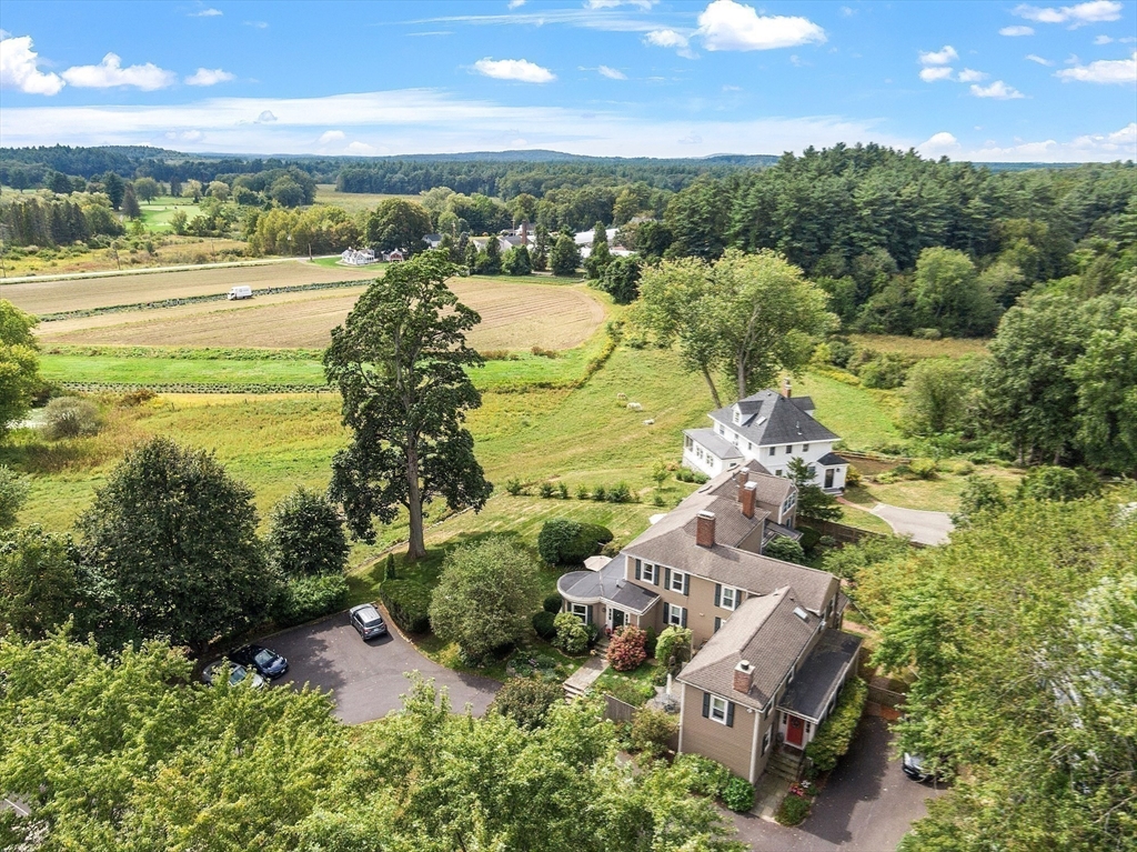 394 Plainfield Road, Unit 394 Concord, MA 01742 - Photo 38 of 40 an aerial view of residential houses with outdoor space and trees