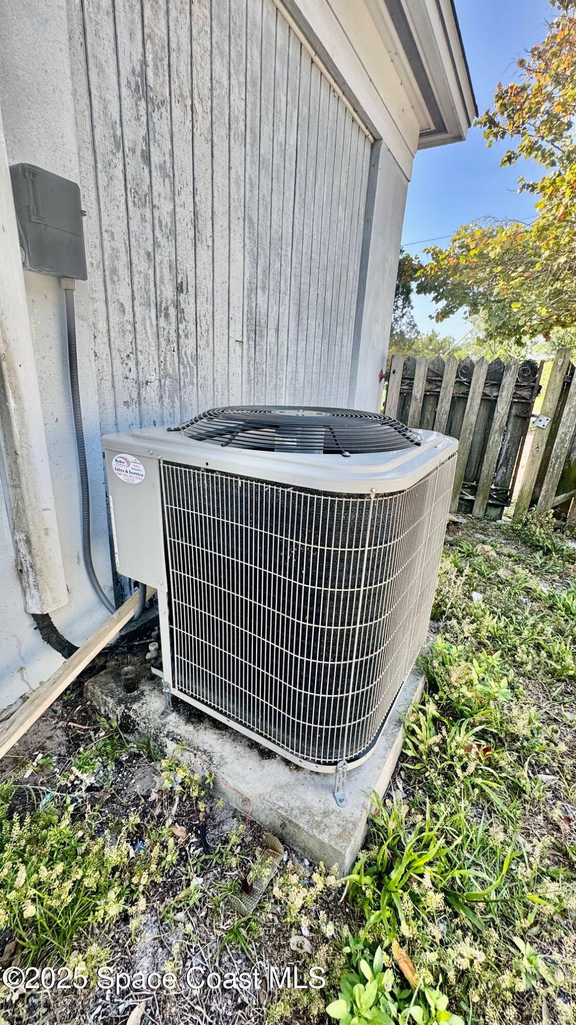 1050 Broadmoor Drive Cocoa, FL 32922 - Photo 6 of 16 west side of home