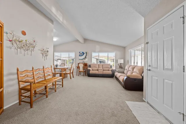 a living room with furniture and a couch