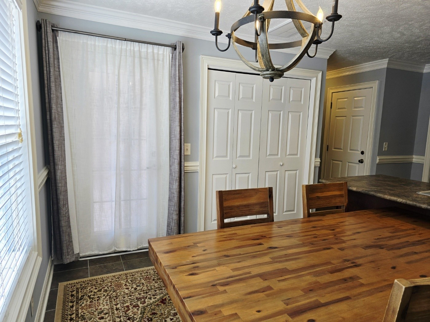 135 Excell Road, Unit 1003 Clarksville, TN 37043 - Photo 11 of 39 a bedroom with a bed and a dresser