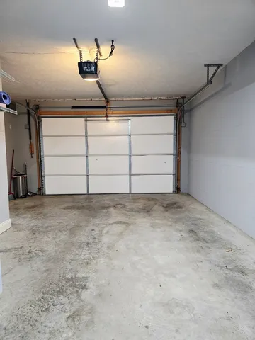 a view of room that has a wooden floor