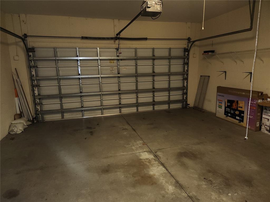 6642 Tailfeather Way Bradenton, FL 34203 - Photo 28 of 28 a view of a garage