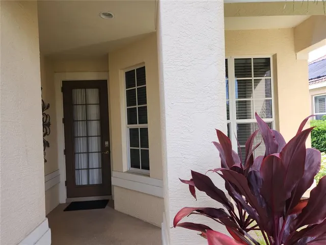 a view of balcony with furniture