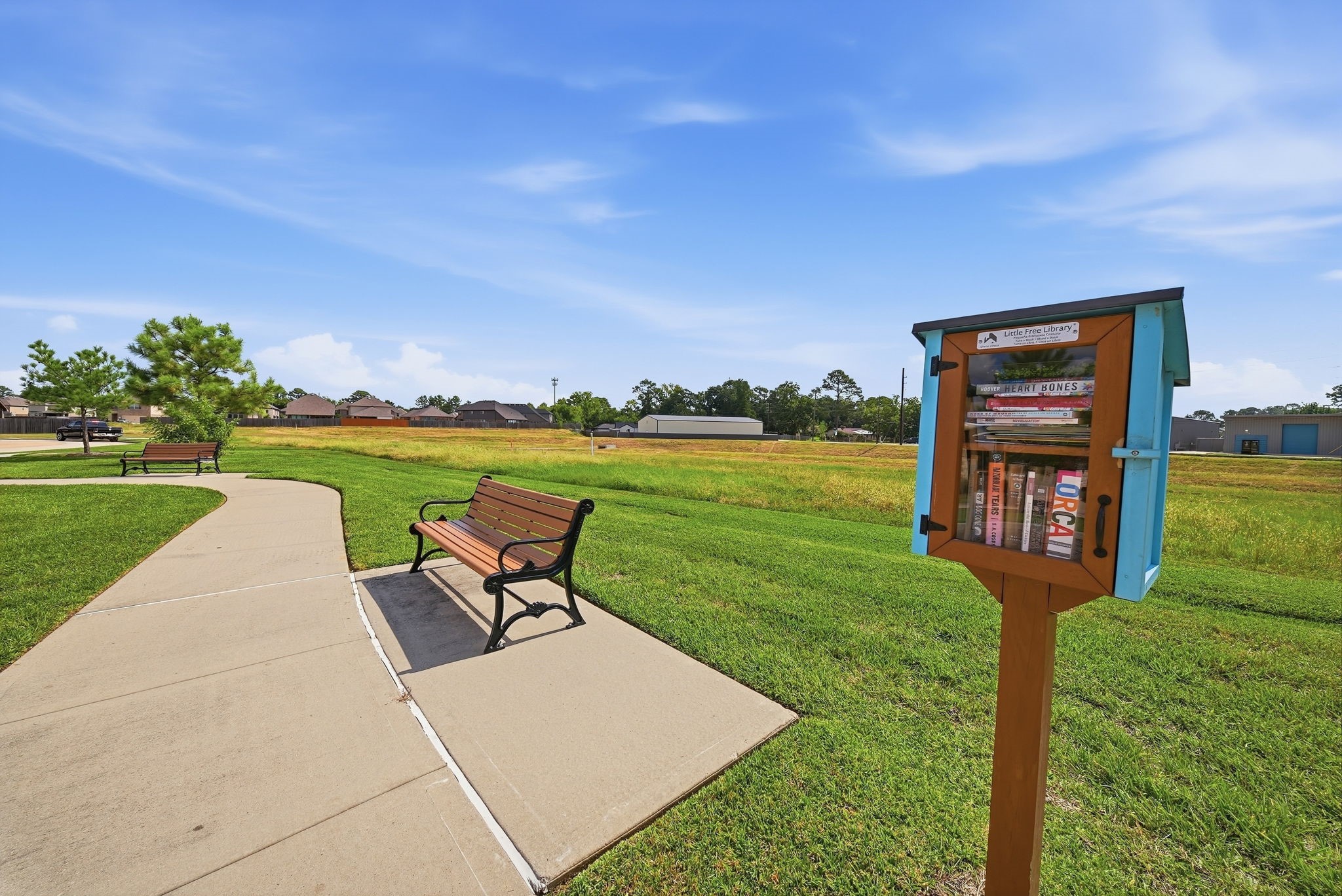 17714 Sugar Magnolia Lane Spring, TX 77379 - Photo 20 of 24 Steps from neighborhood green space, walking paths, and a community little library.
