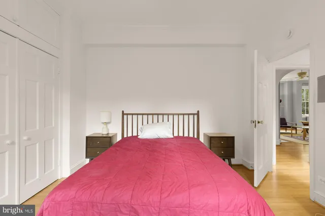 a bedroom with a bed and a view of bedroom