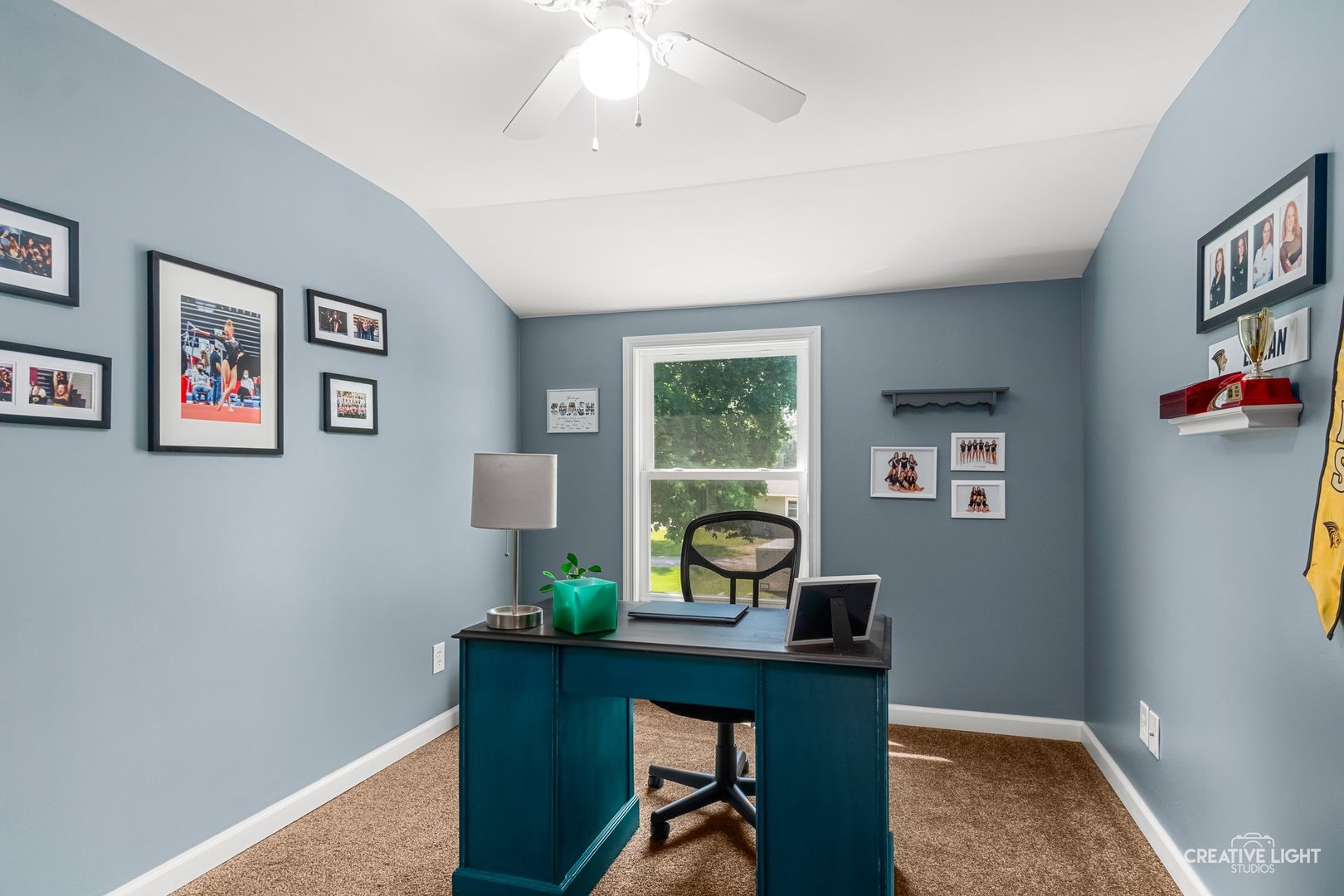 1606 Clark Street DeKalb, IL 60115 - Photo 13 of 20 a view of a workspace with furniture and a window