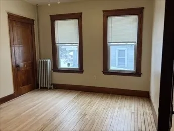 a bathroom with a tub and shower