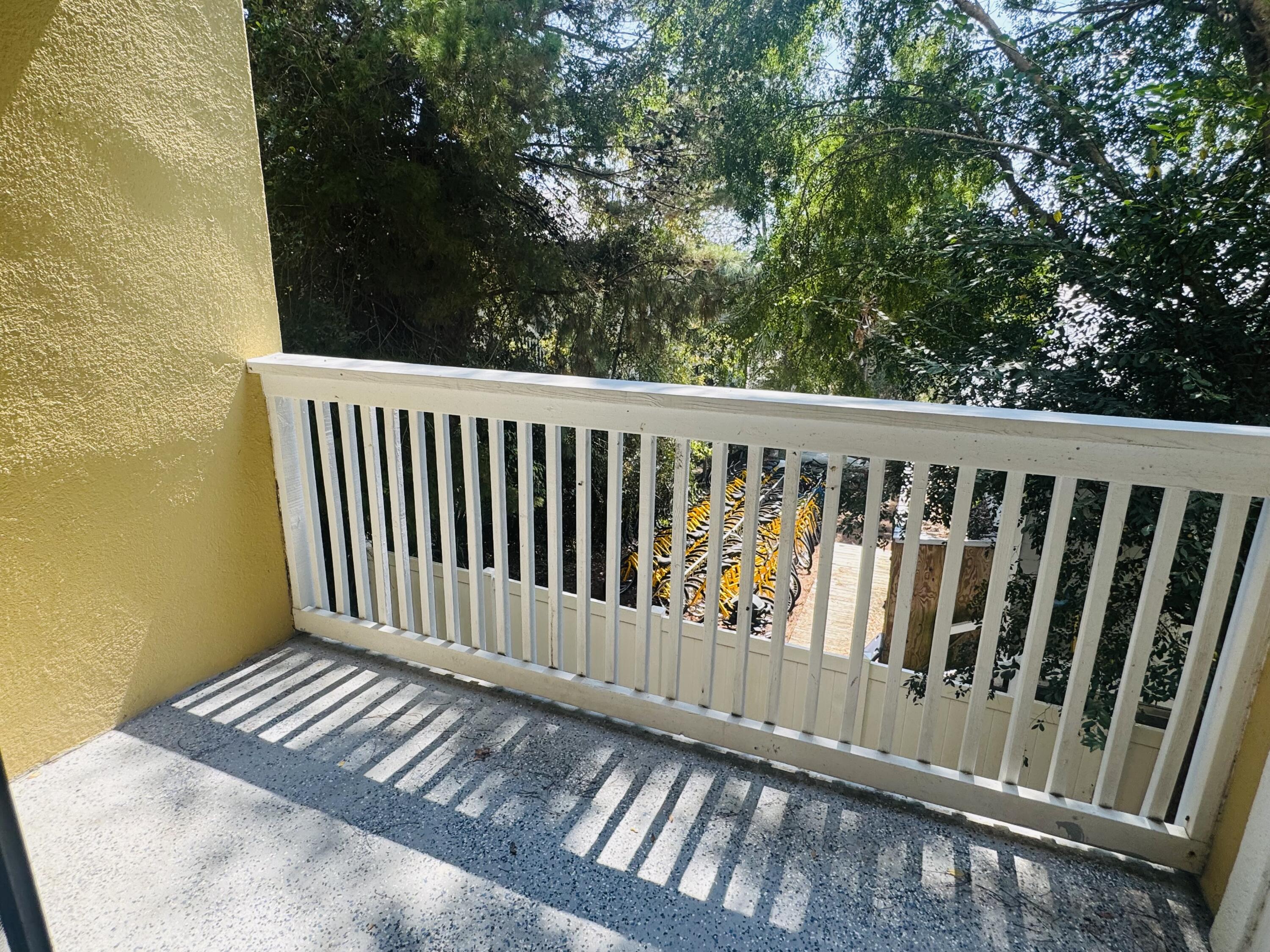 34 Heron's Watch Way, Unit 3202 Santa Rosa Beach, FL 32459 - Photo 12 of 15 a view of a balcony with wooden floor