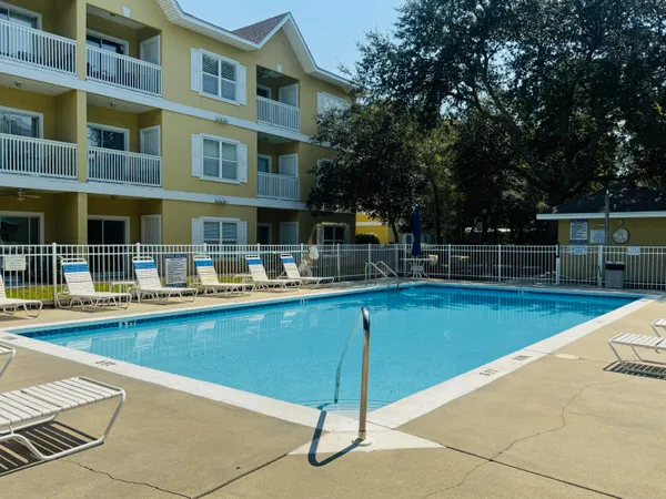 a view of a hallway with a room
