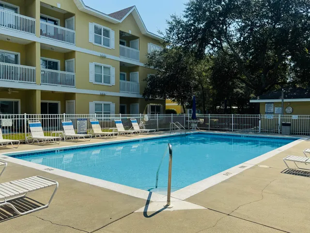 a view of a hallway with a room