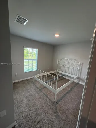 en empty room with windows