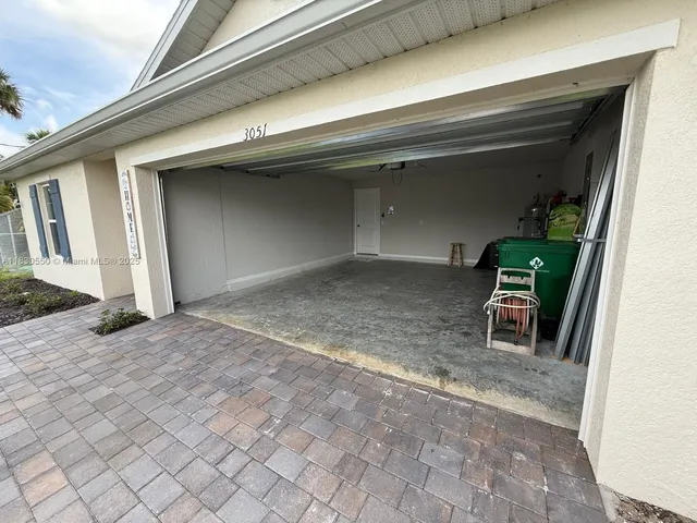 a view of house with outdoor space and street view