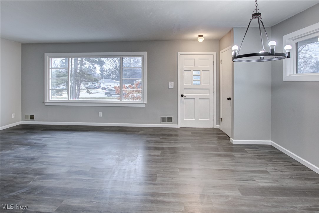 19819 Drake Road Strongsville, OH 44149 - Photo 5 of 27 Entrance foyer with a chandelier and wood finished floors