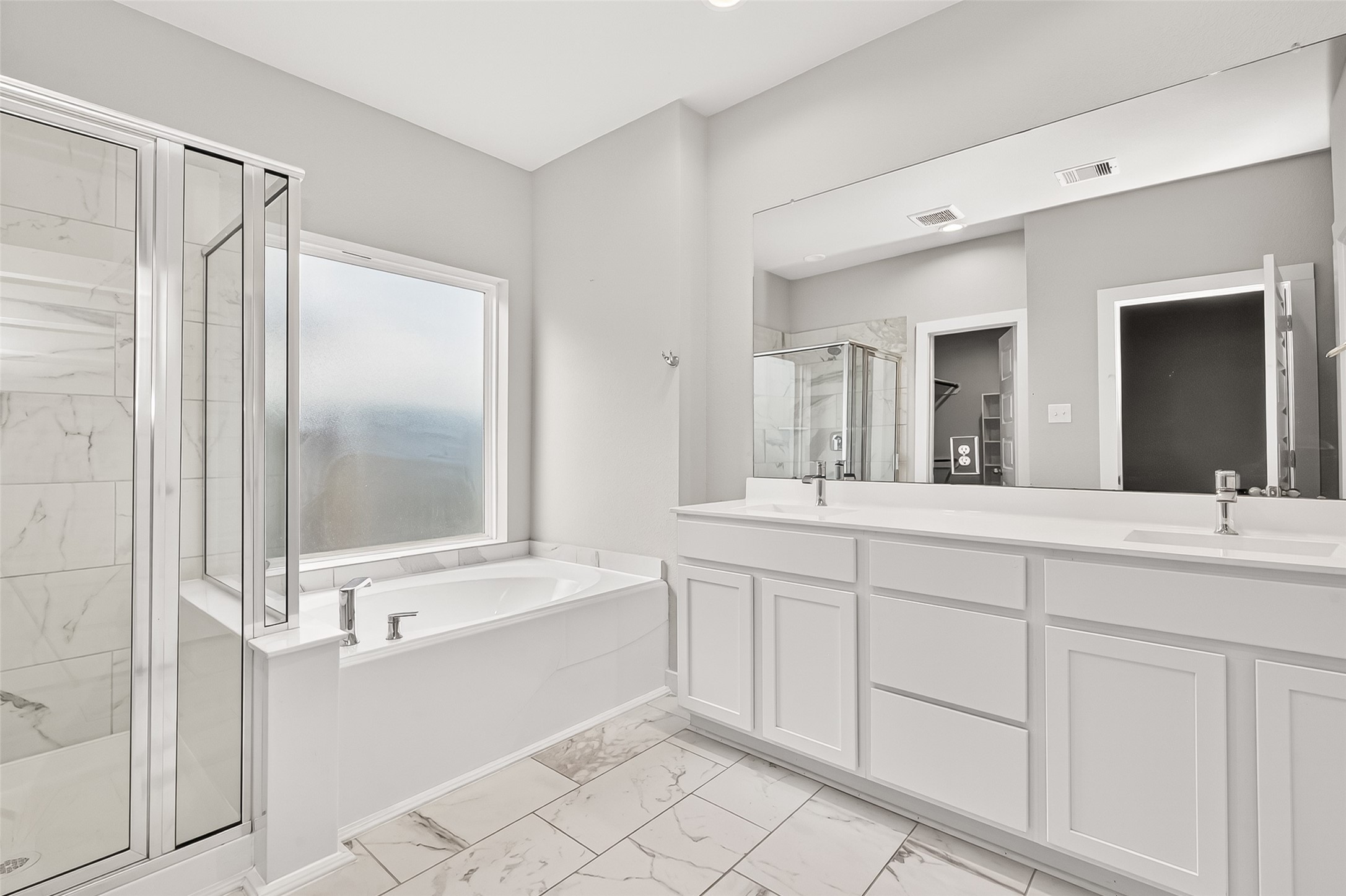 2142 Reed Cave Lane Spring, TX 77386 - Photo 27 of 50 a bathroom with a double vanity sink mirror and