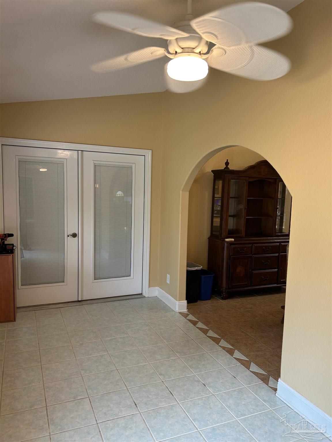 5668 Als Way Milton, FL 32583 - Photo 19 of 48 a view of a livingroom with a chandelier
