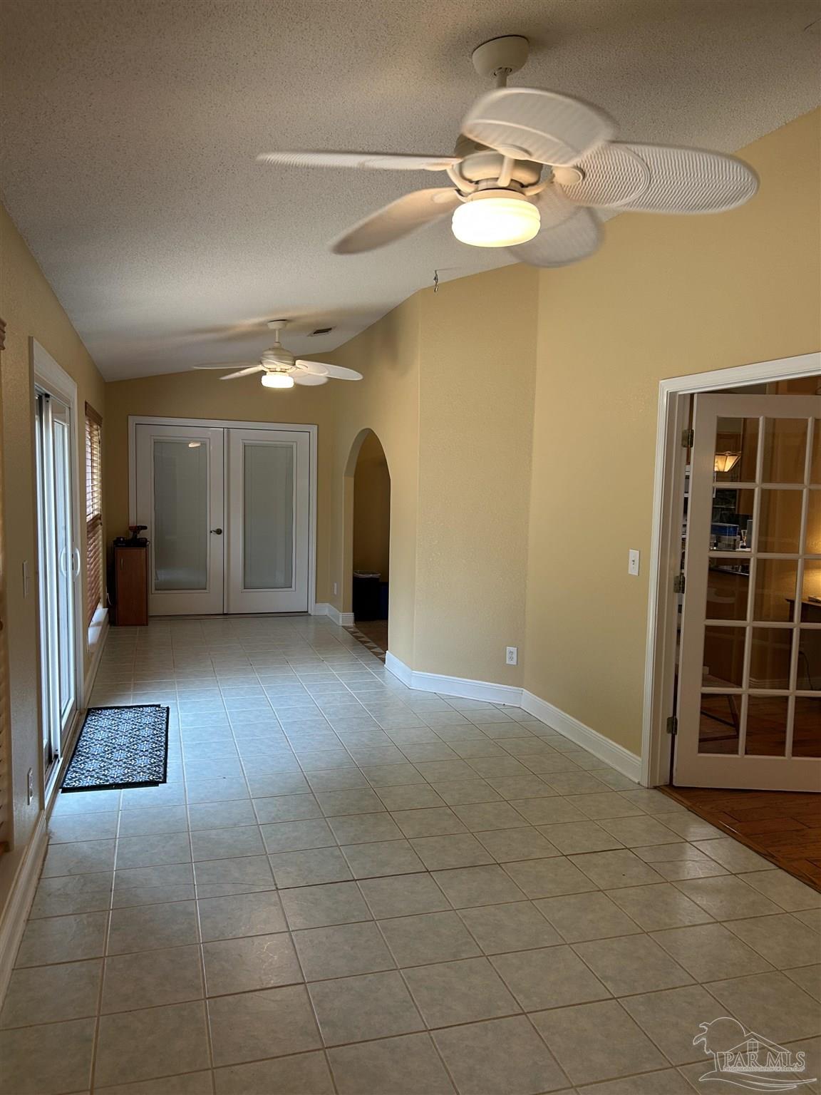 5668 Als Way Milton, FL 32583 - Photo 20 of 48 a view of livingroom with furniture and a chandelier