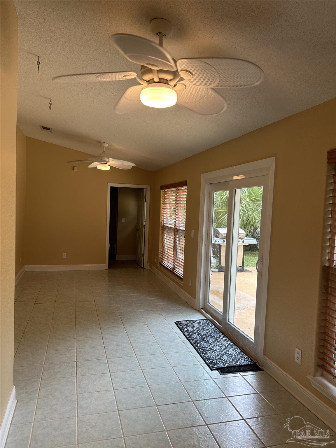 5668 Als Way Milton, FL 32583 - Photo 22 of 48 a view of an empty room with a window